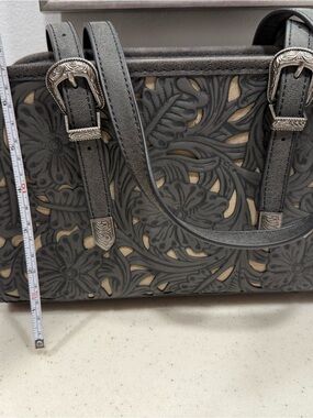 Montana west Black Floral Tooled Tote Bag with Silver Buckle Accents
